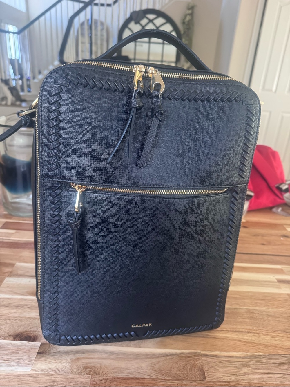 Calpak Black Structured Saffiano Backpack with Gold Hardware